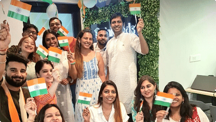 Unischolars gallery - group of cheerful people celebrating with indian flags